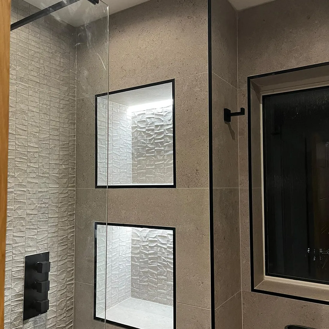 tiled shower enclosure with glass blocks